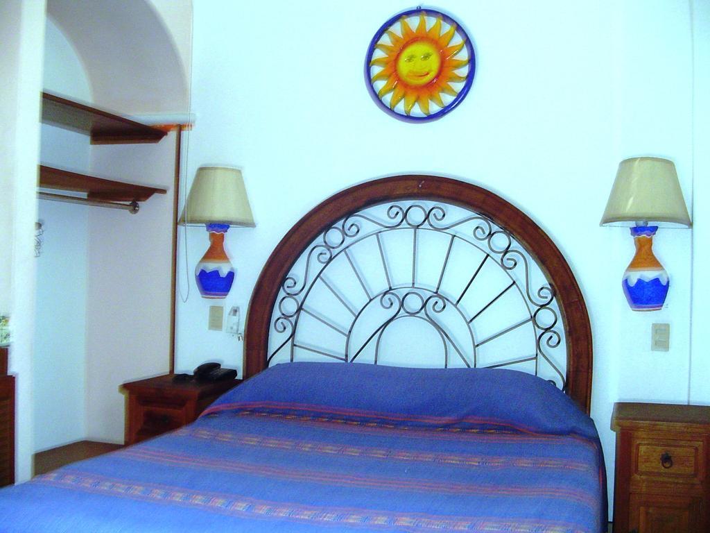 بويرتو فالارتا Hotel & Suites Coral الغرفة الصورة